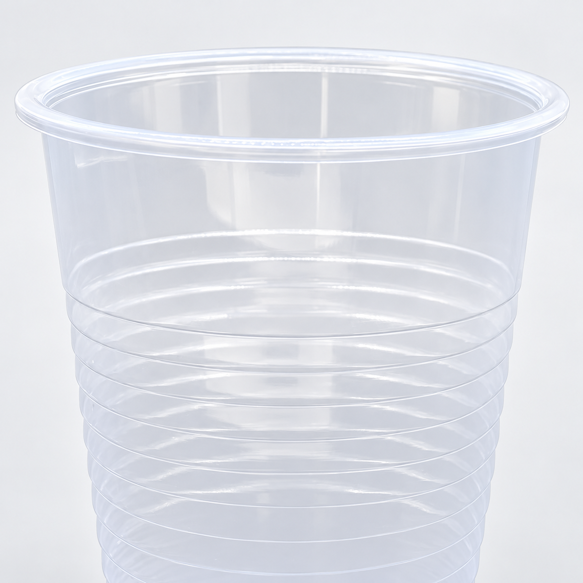 Genuine Joe 12 oz clear cup, rim and plastic wall detail
