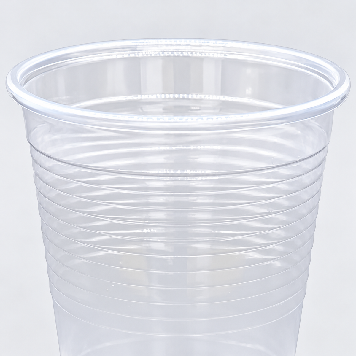 Genuine Joe 5 oz clear cup, rim and rib pattern detail